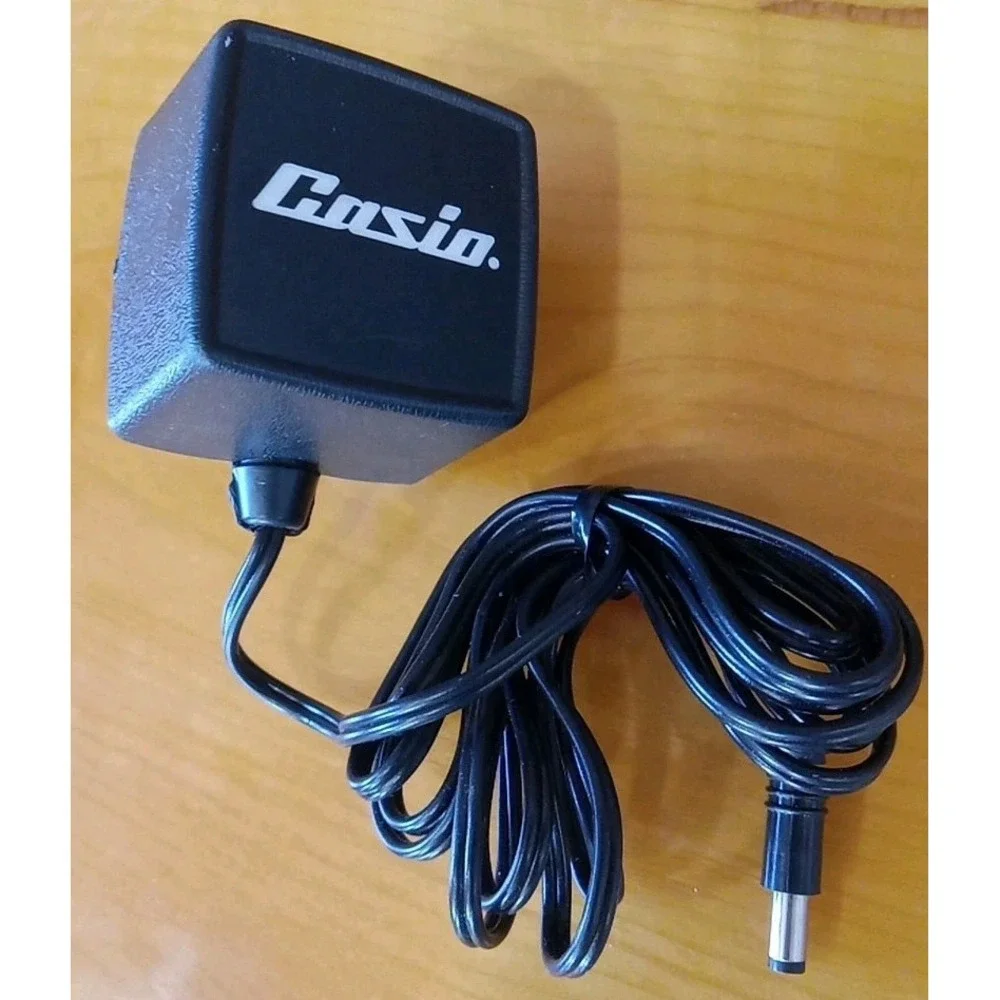 Casio LR 21061 AC Adapter Cat. No. 2-3560 Power Supply 2.35VDC 150mA